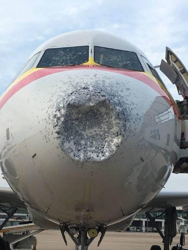 A view of the Tianjin Airlines passenger plane from flight A320 after it was hit by hail July 26 2018