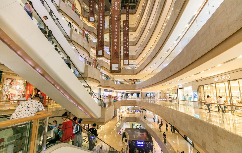 People shop at a mall in Nanjing Jiangsu province