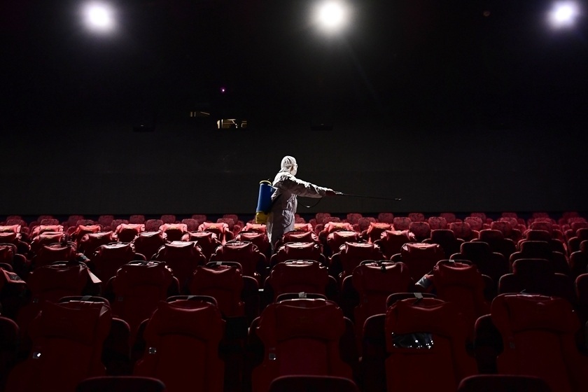 Movie theaters in certain parts of China are being allowed to reopen