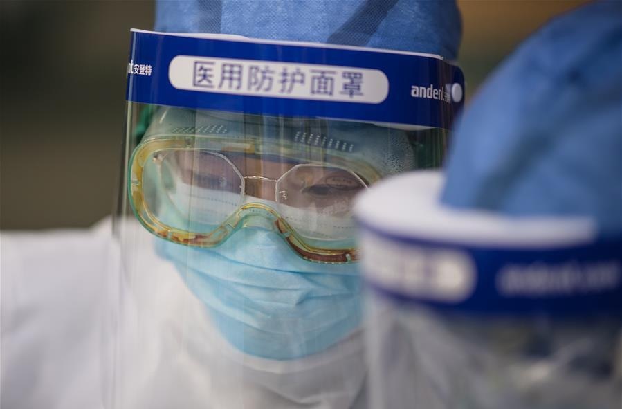 Medical staff work in the isolation ward at Wuhan No 1 Hospital in Wuhan