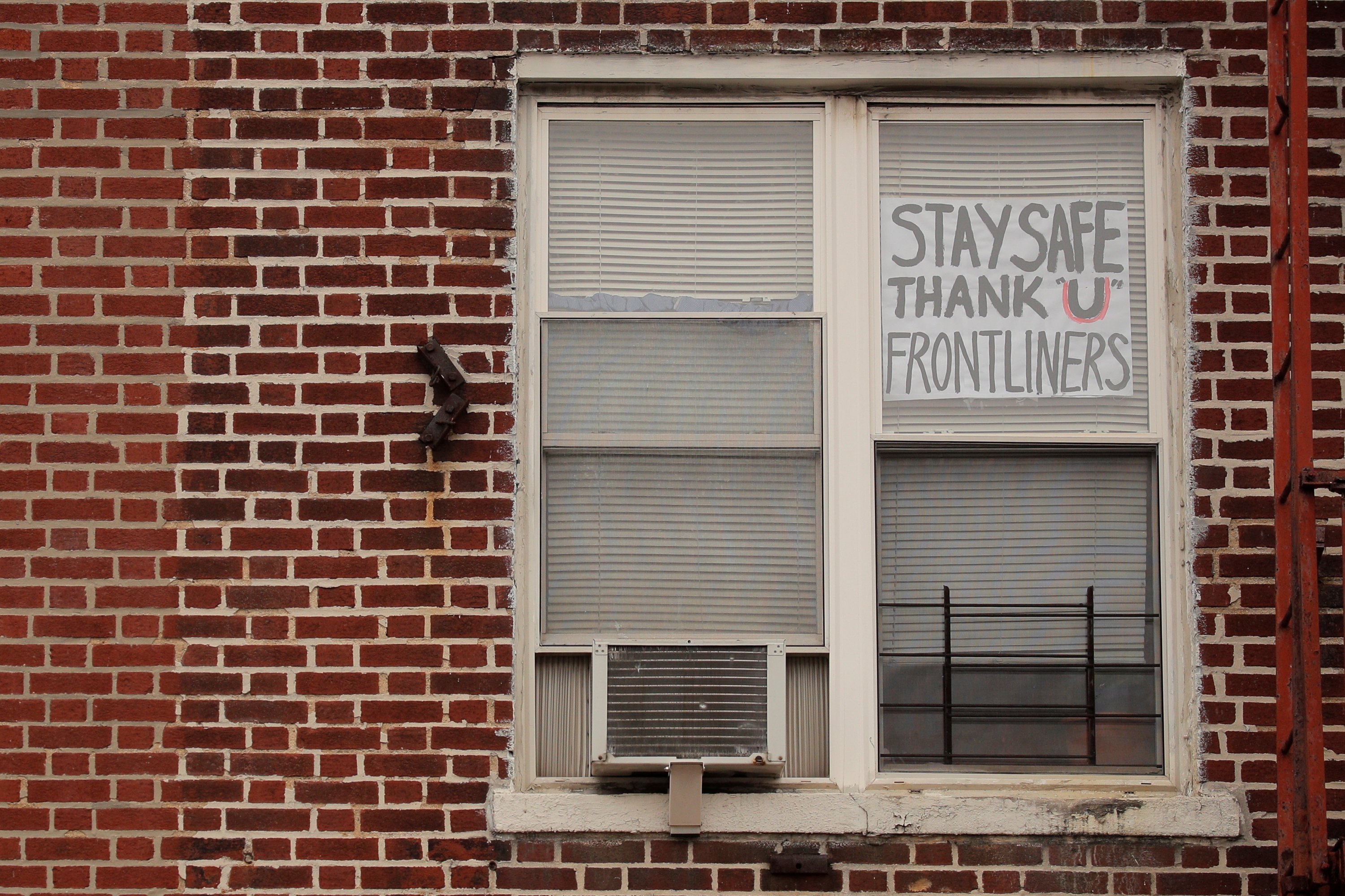 A sign thanking frontline workers is seen on an apartment window in the Brooklyn borough of New York City U.S. Wednesday April 8 2020