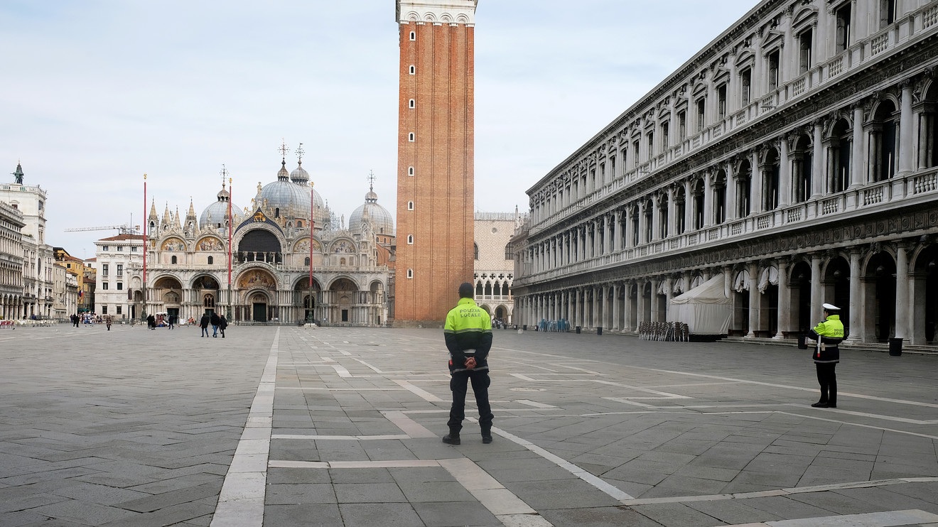 A nearly empty St. Marks Square in Venice Italy in March